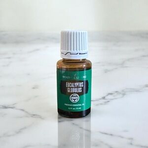 Young Living Eucalyptus Globulus Essential Oil in Green and Brown